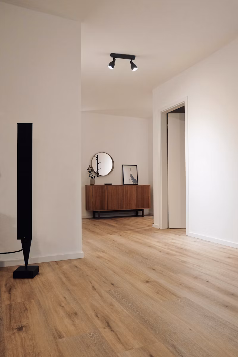 Room with newly installed hardwood flooring